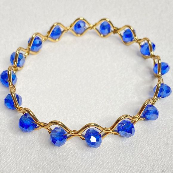 Bangle Bracelet Gold Tone Wire Encasing True Blue Faceted Rhinrstones - Picture 3 of 8